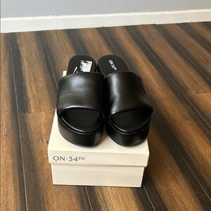 Black platform sandals.